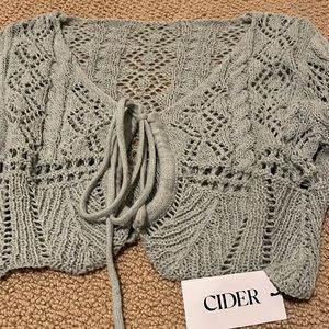 Daisy Jones vibes! Cute cropped crochet cardi in a minty sage.